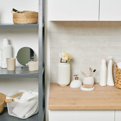 A shelf with a variety of home and bodycare items in modern flat