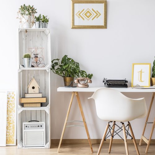 Modern home office area with desk and armchair